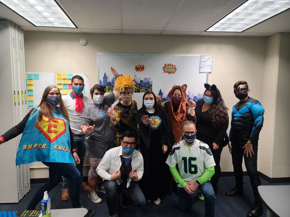 Express CU staff dressed up in Superhero costumes
